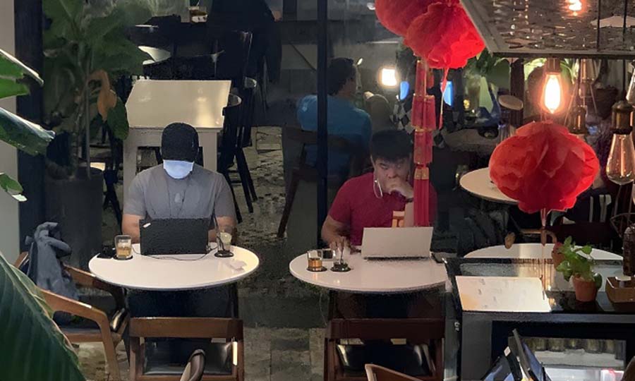 People using Wi-Fi in a Vietnamese cafe